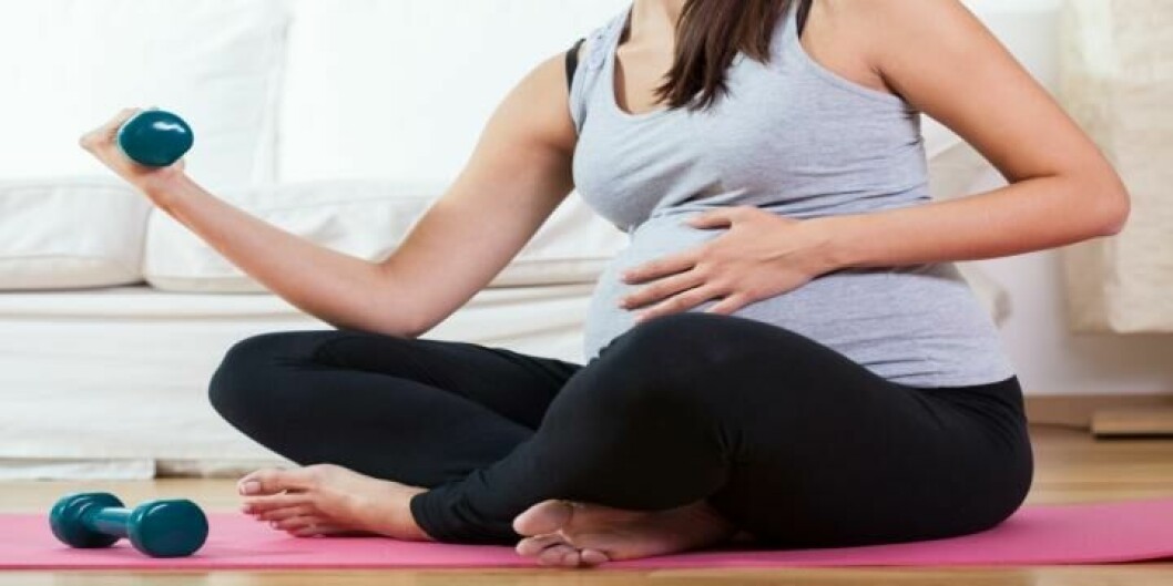 Gravid träning mage hantlar yoga